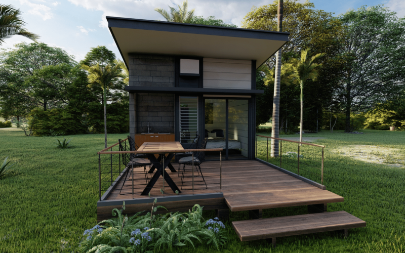 Une maison tiny house construite dans un jardin